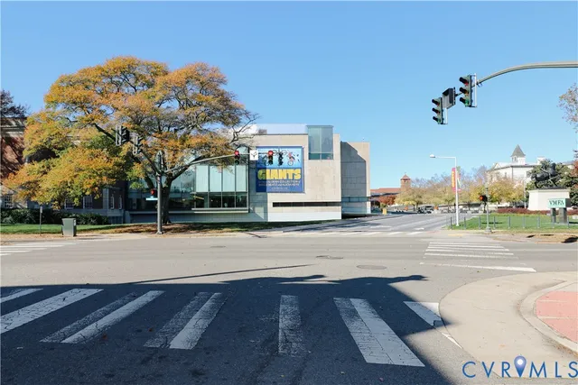 a view of street with large buildings