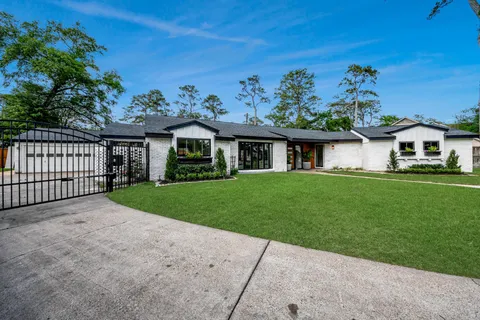 a view of a house with a garden