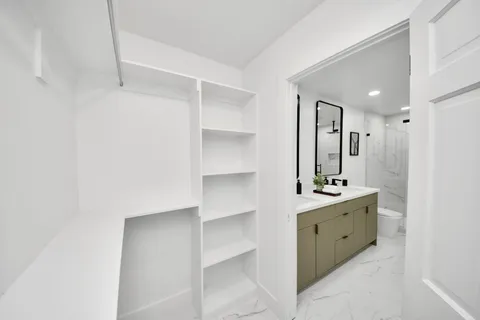 a large white room with a large window