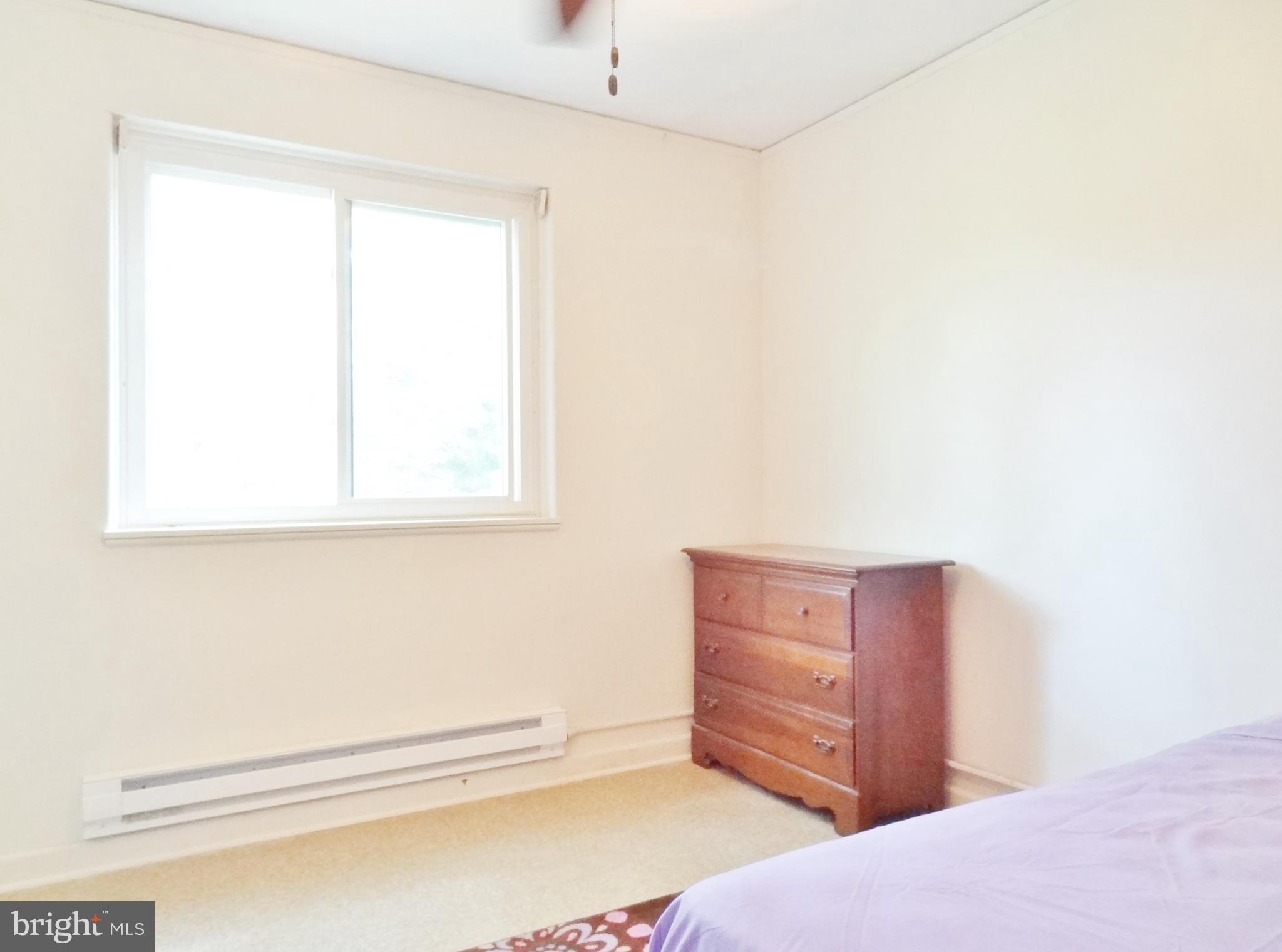 39 Ridge Road, Unit L Greenbelt, MD 20770 - Photo 14 of 15 a view of a dresser with window