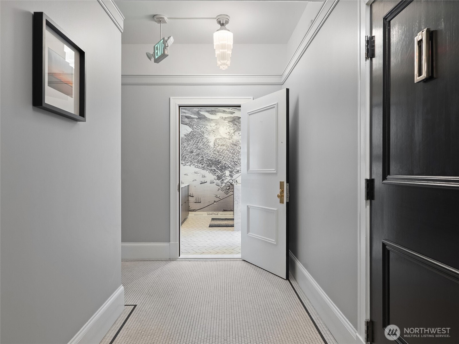 1519 3rd Avenue, Unit 501 Seattle, WA 98101 - Photo 13 of 37 a view of a hallway with wooden floor
