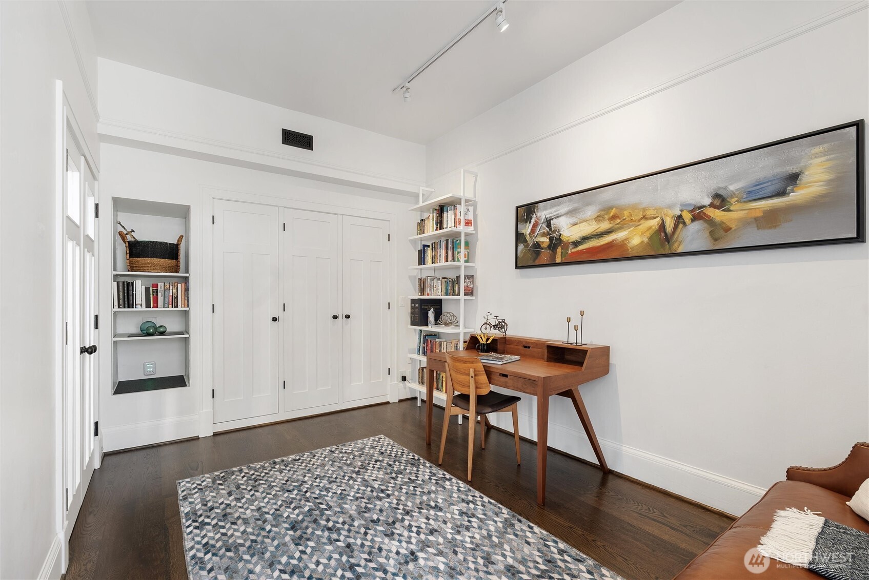 1519 3rd Avenue, Unit 501 Seattle, WA 98101 - Photo 22 of 37 a room with furniture and rug