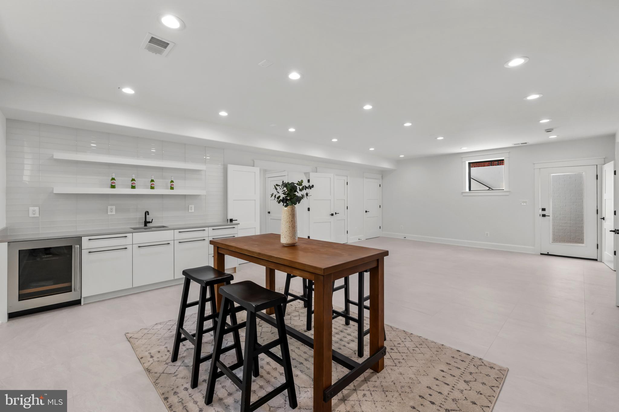 3108 Key Boulevard Arlington, VA 22201 - Photo 23 of 28 LOWER LEVEL REC ROOM / WET BAR