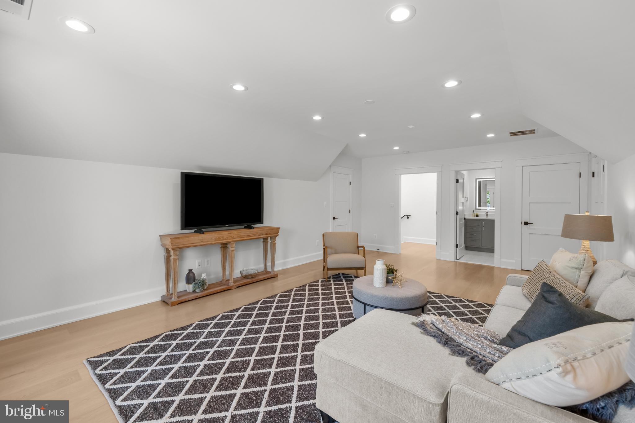 3108 Key Boulevard Arlington, VA 22201 - Photo 32 of 44 a living room with furniture and a flat screen tv