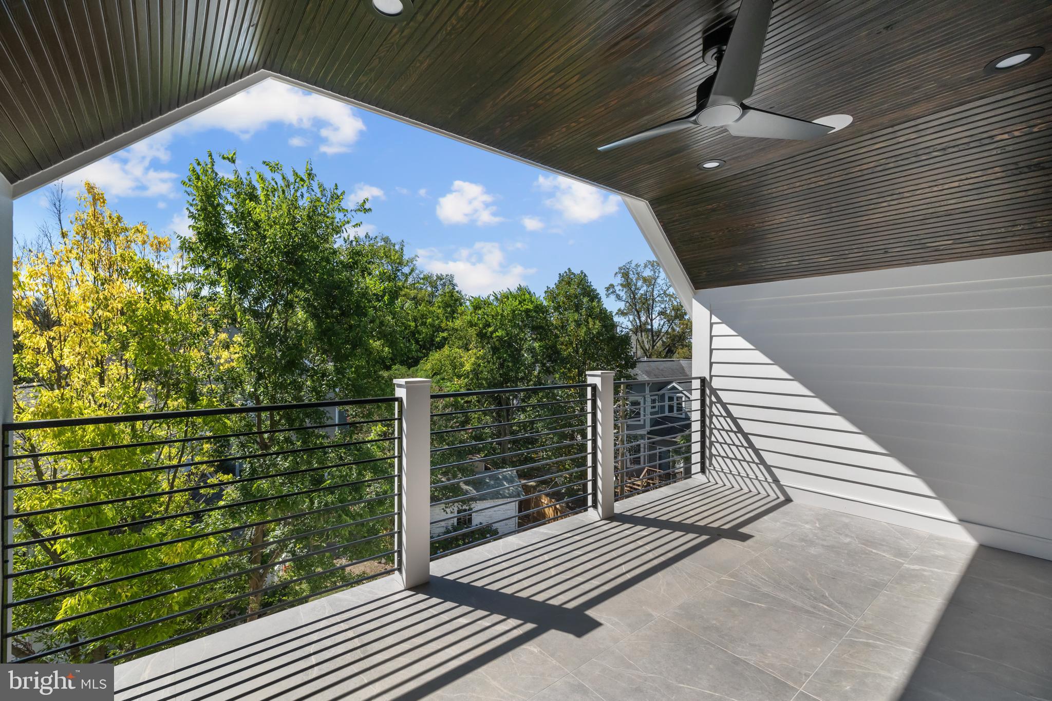 3108 Key Boulevard Arlington, VA 22201 - Photo 35 of 44 a balcony with wooden floor