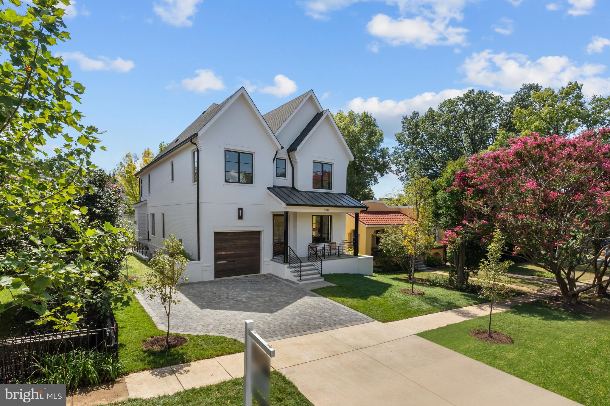 3108 Key Boulevard Arlington, VA 22201 - Photo 4 of 44 a front view of a house with yard and green space