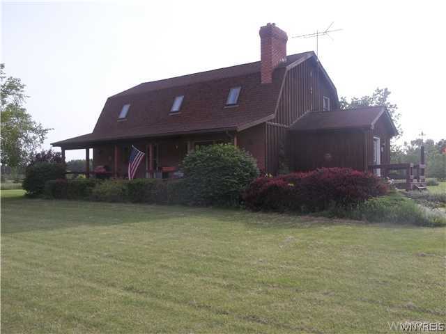 3100 Daniels Road Wilson, NY 14131 - Photo 1 of 1 Exterior Front Covered porch for relaxing or enjoy