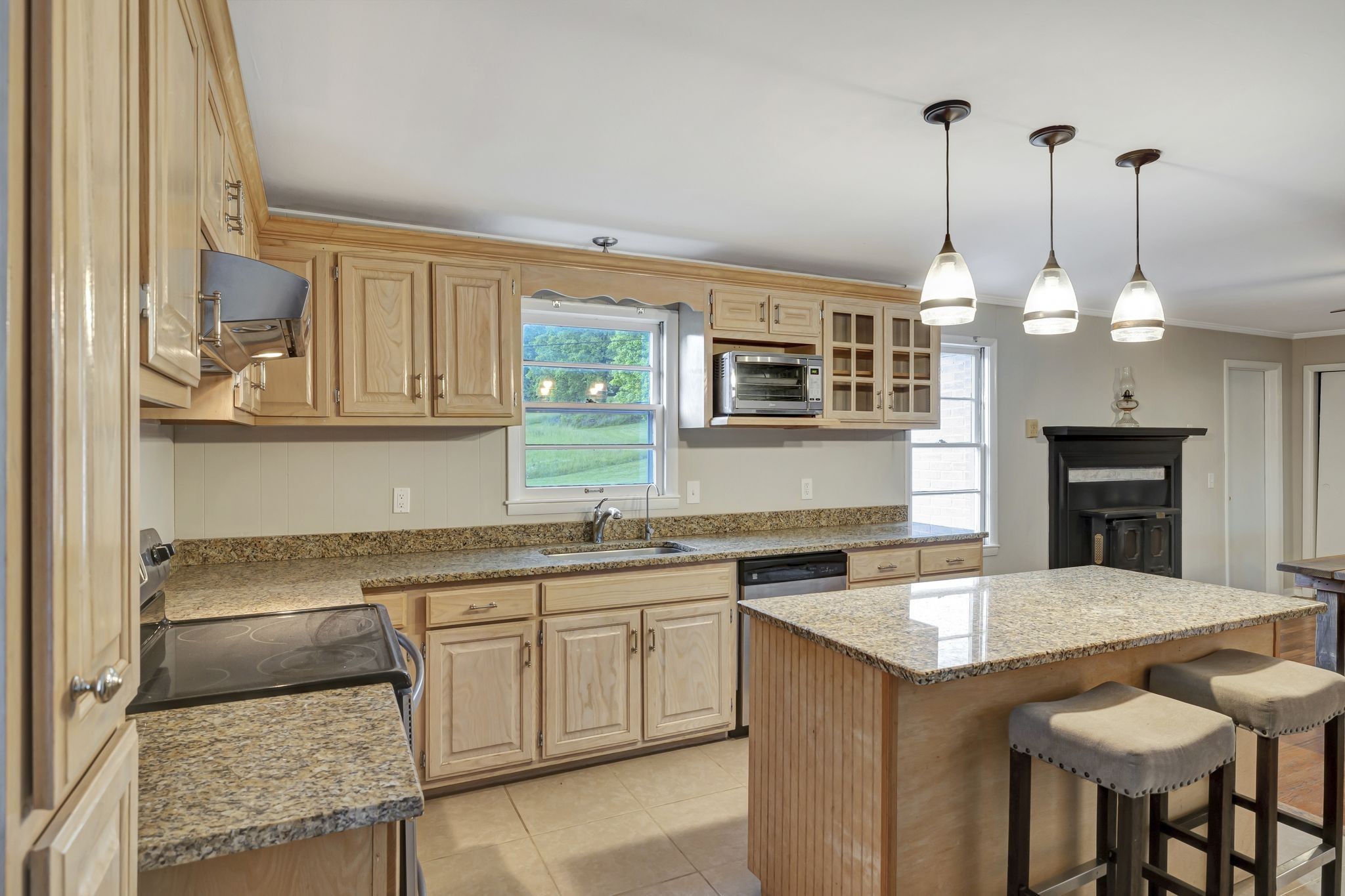2538 Ragsdale Road Columbia, TN 38401 - Photo 7 of 35 a kitchen with a sink stove and microwave