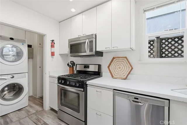 a kitchen with a stove and a sink