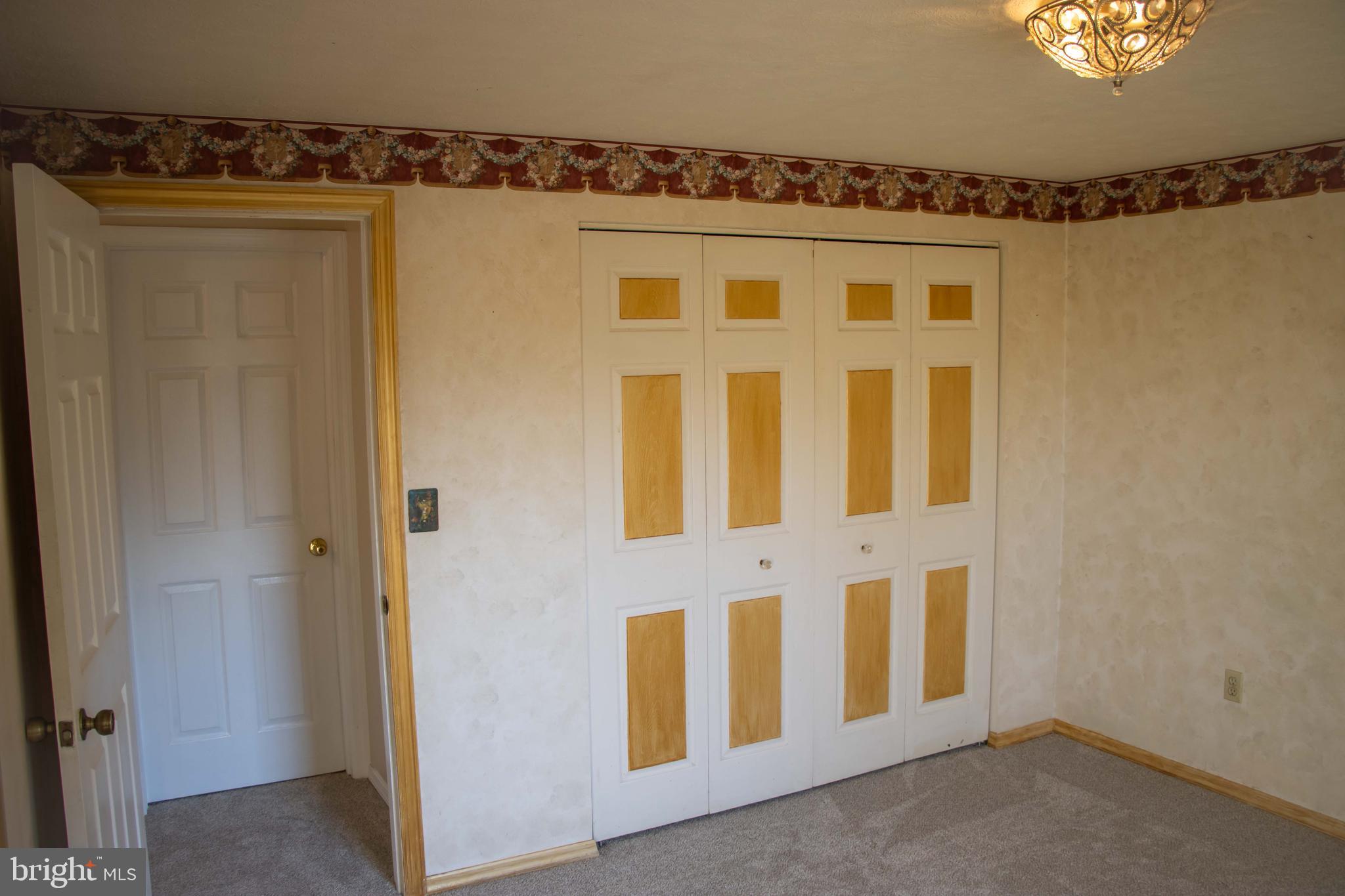 387 West Ridge Loop Road Romney, WV 26757 - Photo 23 of 58 Top Level- Bedroom #3/ Main (second door on right)