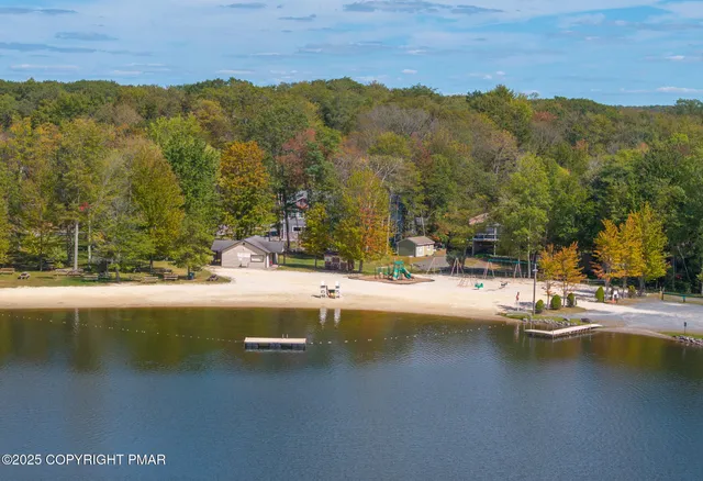 a view of entryway dining room and hall with wooden floor