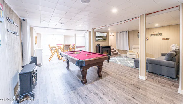 a patio with a table and chairs