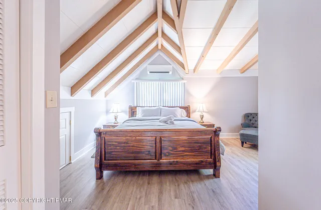 a view of a living room and workspace