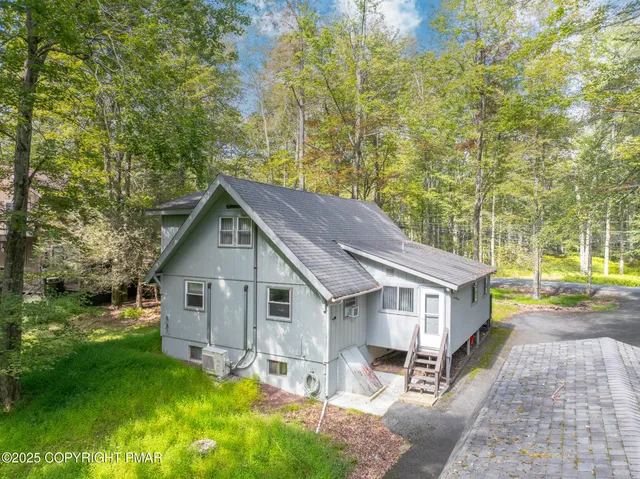 a view of a lake and green space