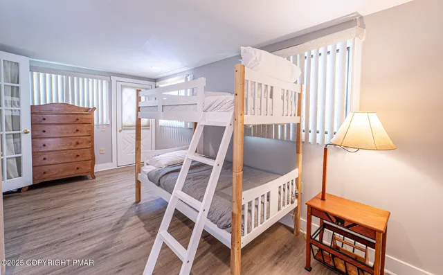 a view of house with backyard