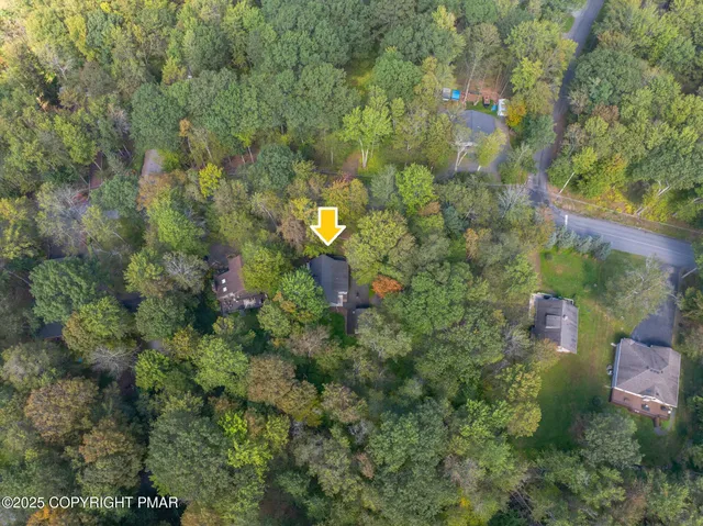 a view of a lake with outdoor seating