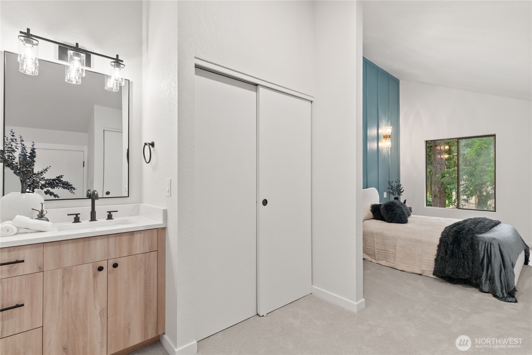 155 South 330th Street, Unit D Federal Way, WA 98003 - Photo 24 of 35 a en suite bathroom with a double vanity sink a mirror and a shower