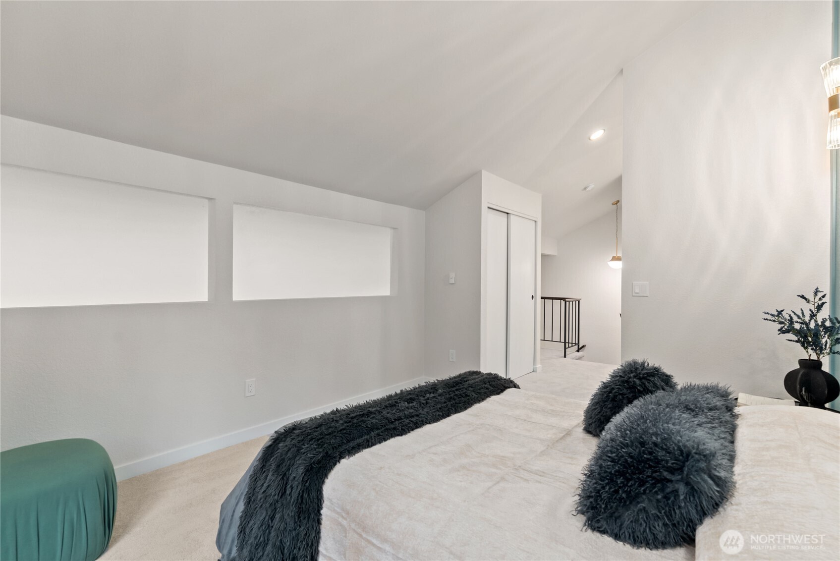 155 South 330th Street, Unit D Federal Way, WA 98003 - Photo 28 of 35 a bedroom with a bed and a lamp