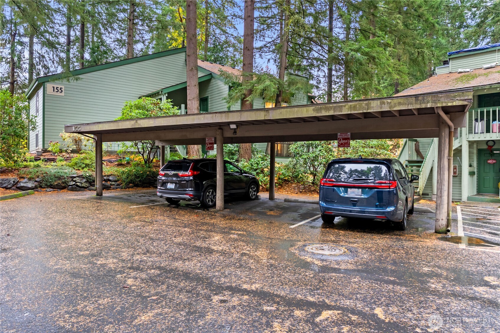 155 South 330th Street, Unit D Federal Way, WA 98003 - Photo 32 of 35 a car parked in front of a house