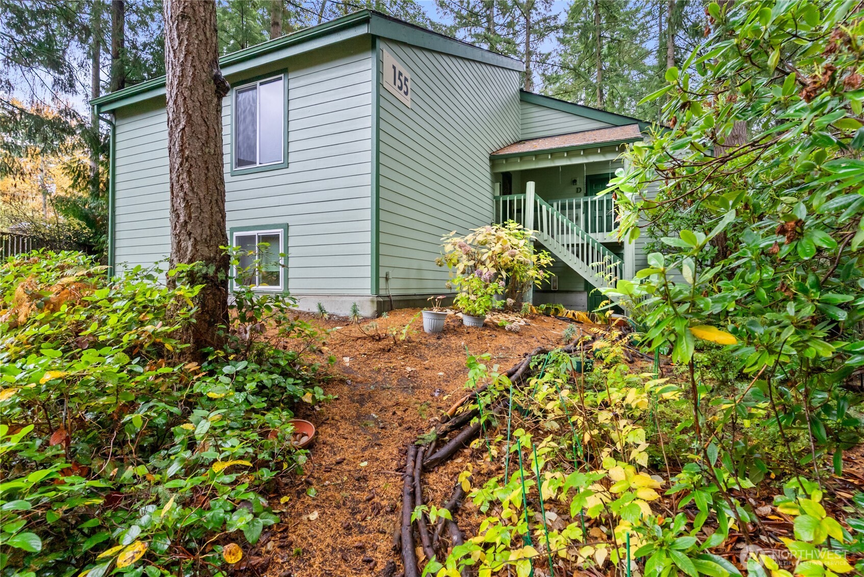 155 South 330th Street, Unit D Federal Way, WA 98003 - Photo 33 of 35 a front view of a house with a yard