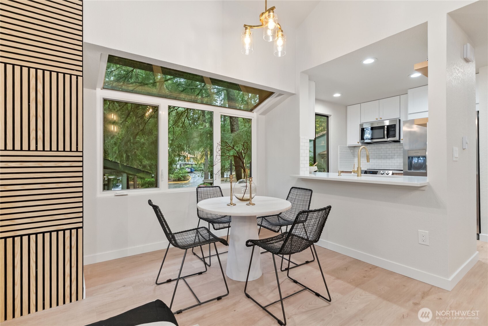 155 South 330th Street, Unit D Federal Way, WA 98003 - Photo 8 of 35 a dining room with furniture and a large window