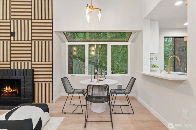 a dining room with furniture and window