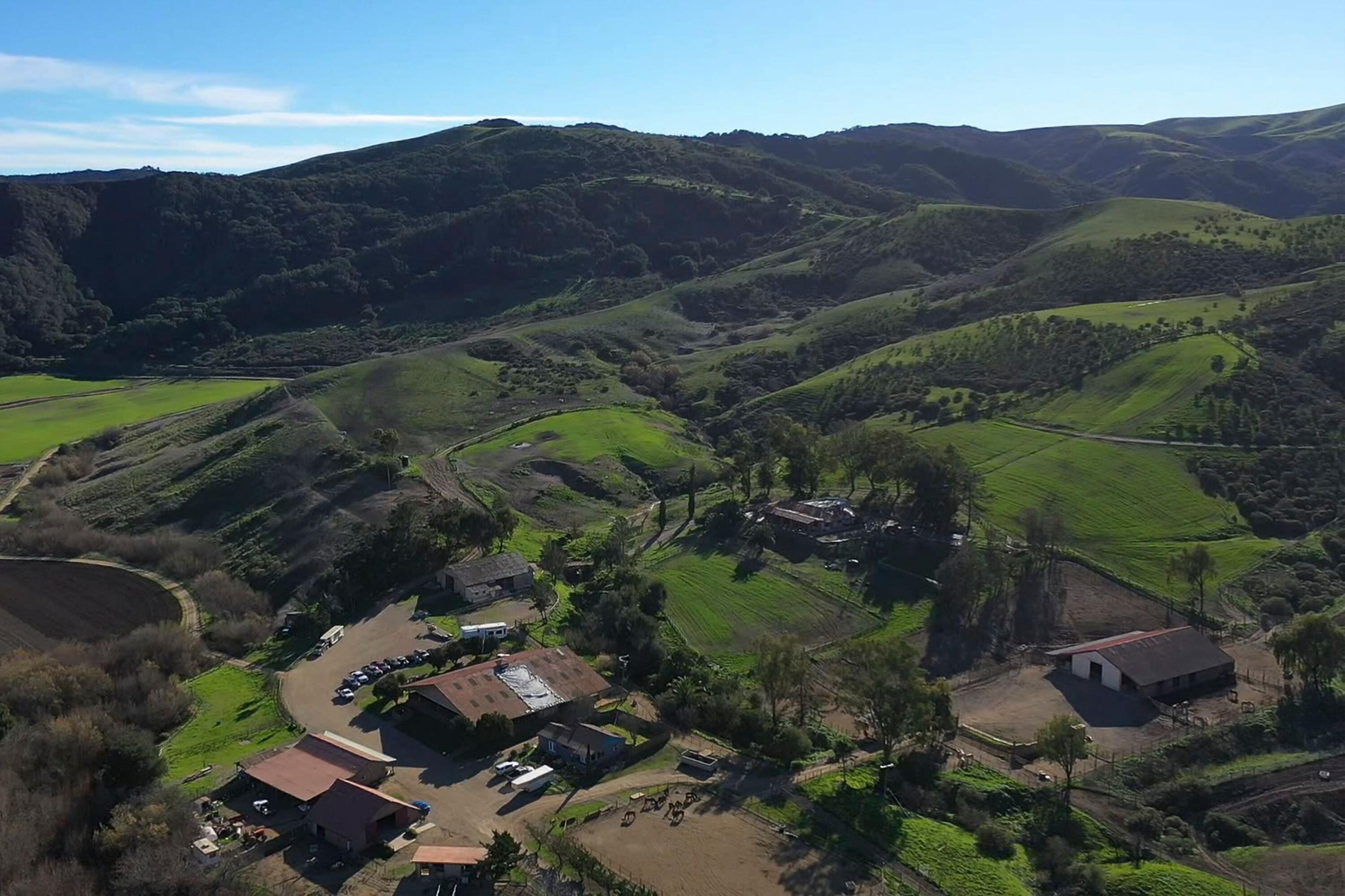 4115 Jalama Road Lompoc, CA 93436 - Photo 27 of 39 a view of a lush green hillside and houses