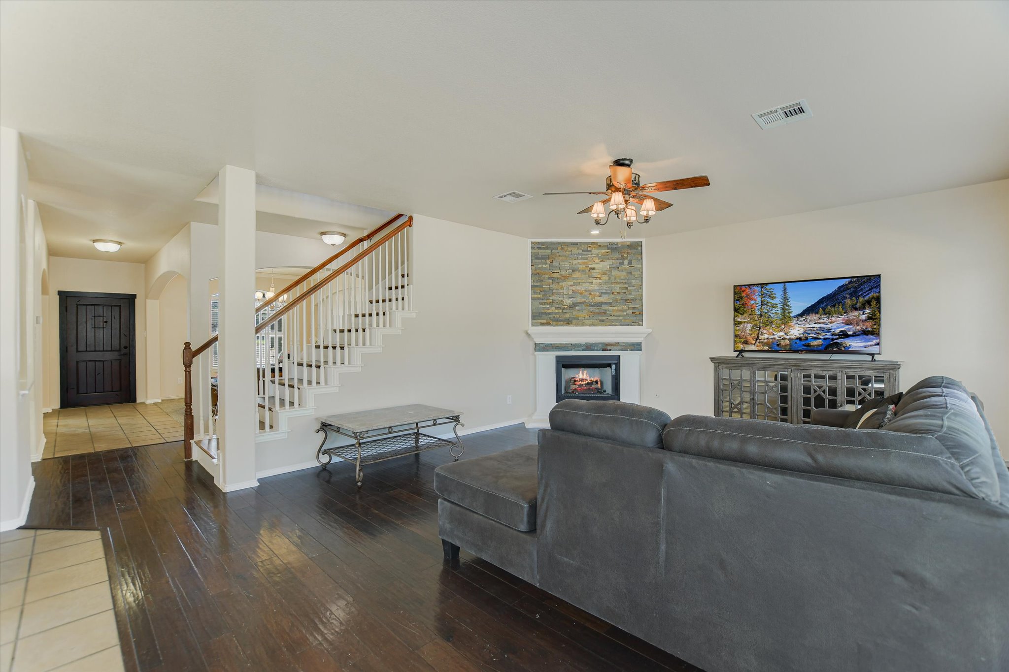 1101 Sedona Leander, TX 78641 - Photo 11 of 25 a living room with furniture and a flat screen tv
