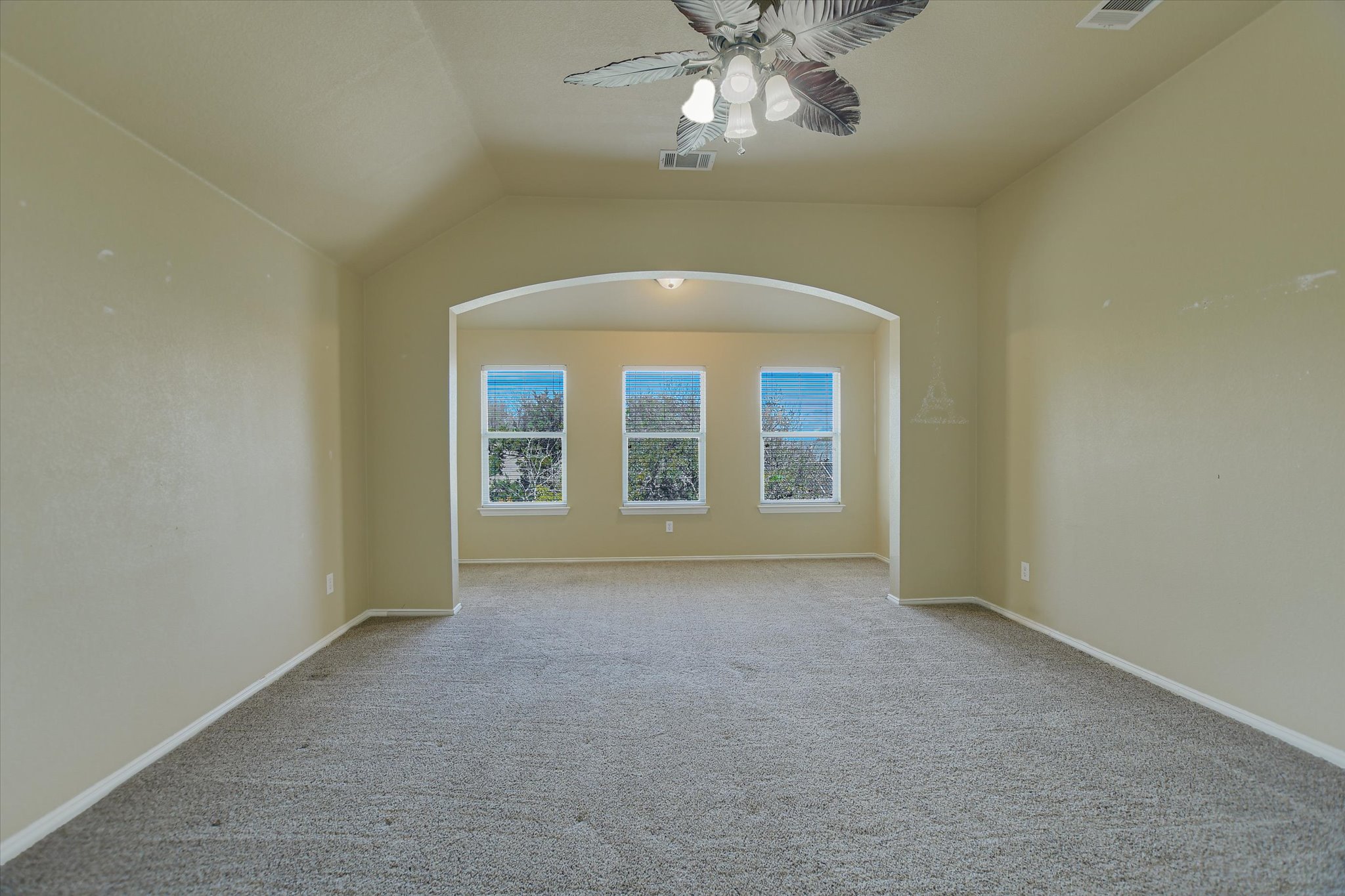 1101 Sedona Leander, TX 78641 - Photo 16 of 25 an empty room with chandelier fan