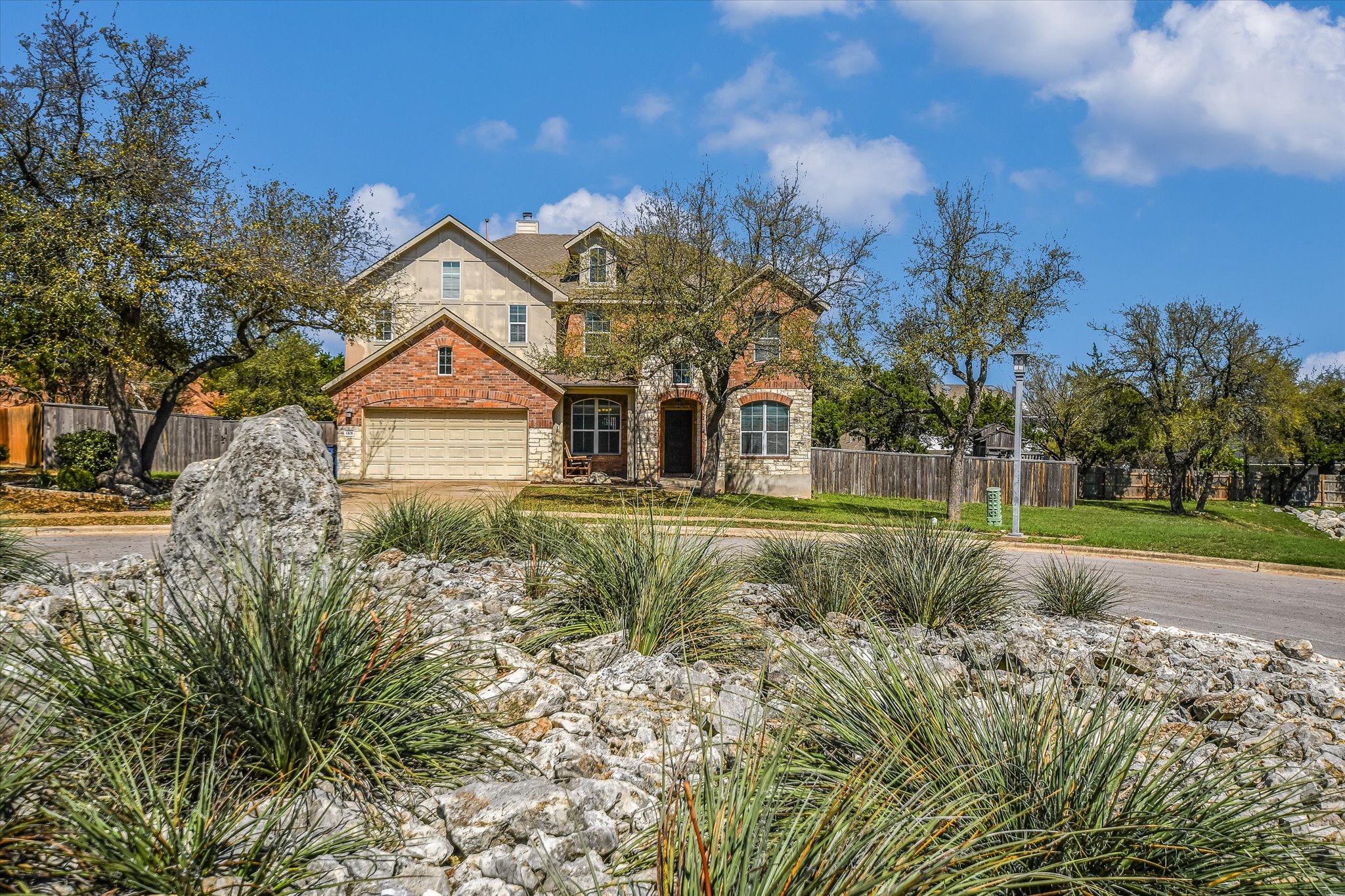 1101 Sedona Leander, TX 78641 - Photo 2 of 25 a view of a street with a building in the background