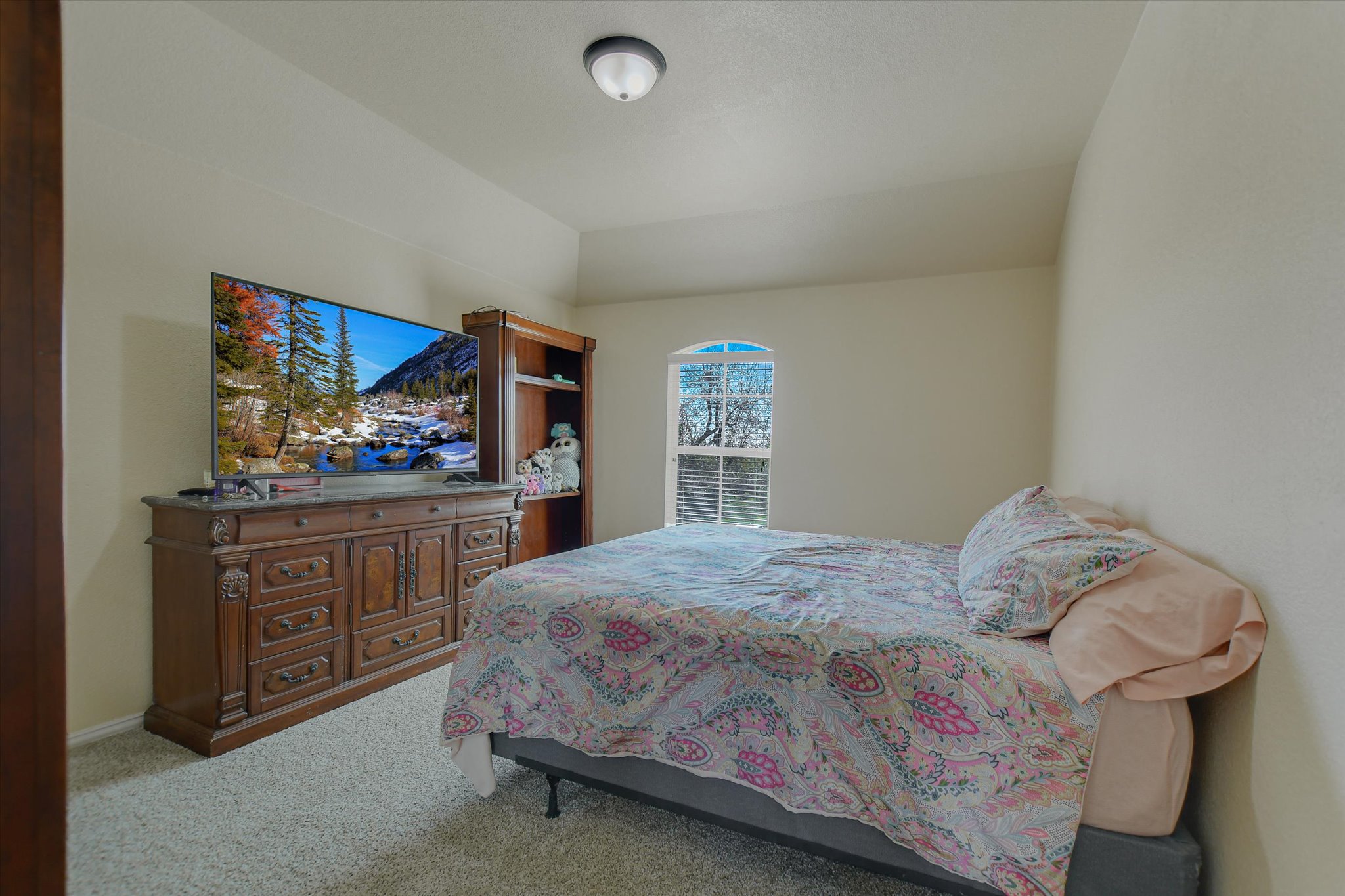1101 Sedona Leander, TX 78641 - Photo 22 of 25 a bedroom with a bed and cabinets