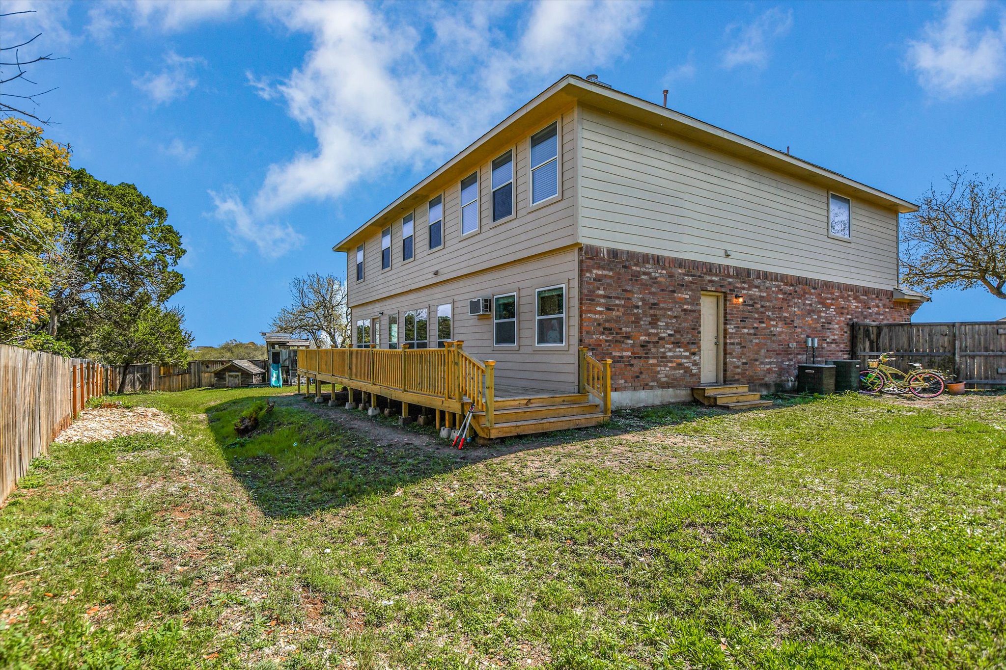 1101 Sedona Leander, TX 78641 - Photo 23 of 25 a view of a house with backyard and sitting area