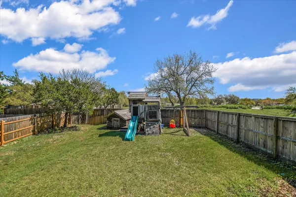 a view of a garden with a slide