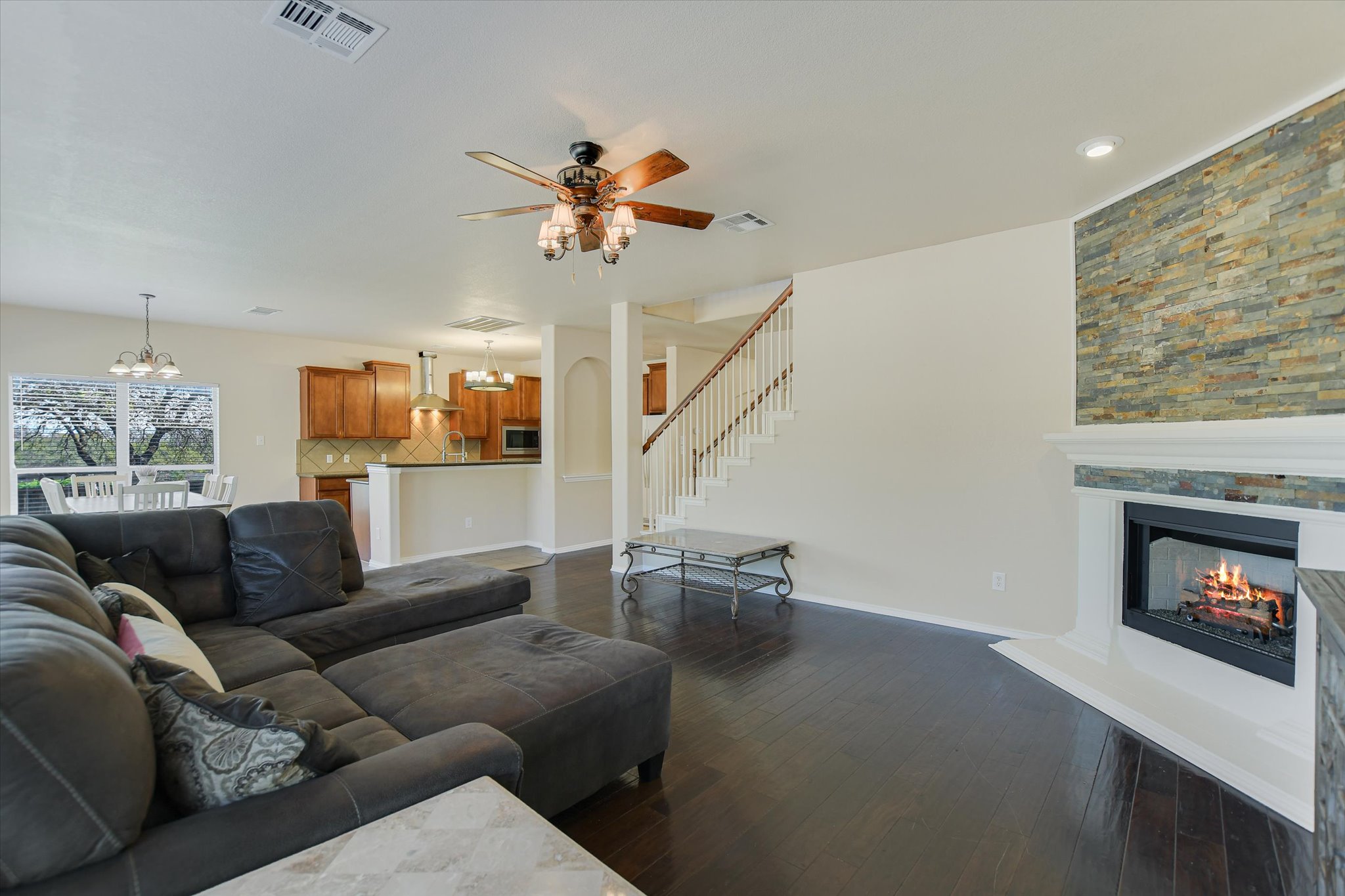 1101 Sedona Leander, TX 78641 - Photo 9 of 25 a living room with furniture and a fireplace