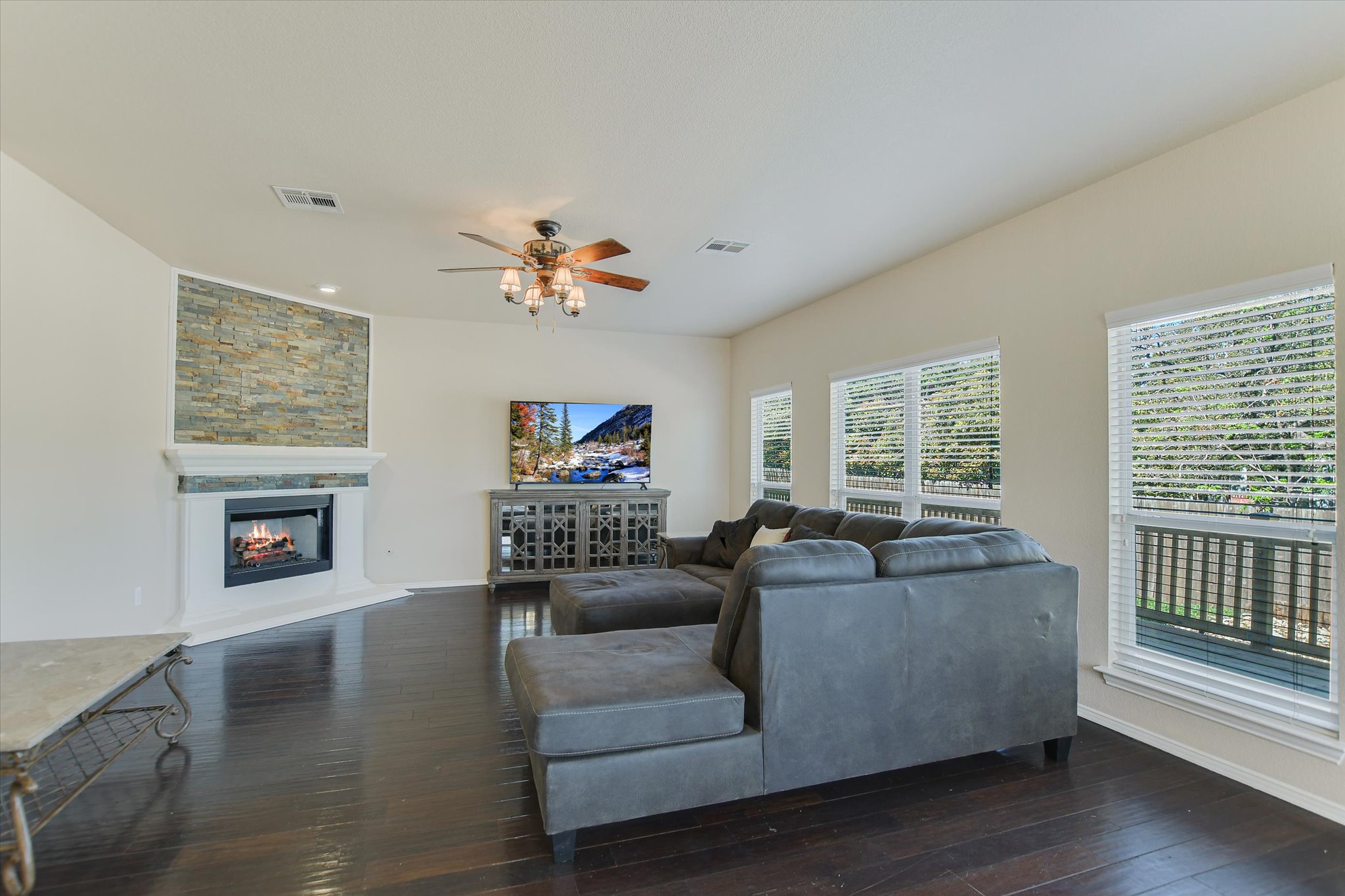 1101 Sedona Leander, TX 78641 - Photo 10 of 25 a living room with furniture and a fireplace