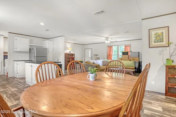 a view of a dining room with furniture