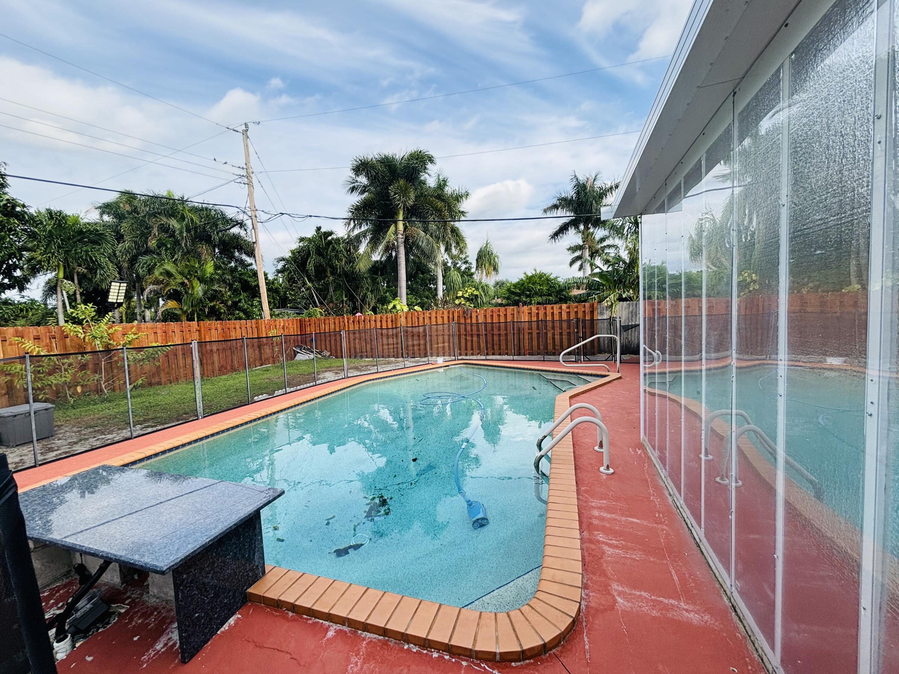 1911 High Ridge Road Lake Worth, FL 33461 - Photo 12 of 13 In-Ground Pool