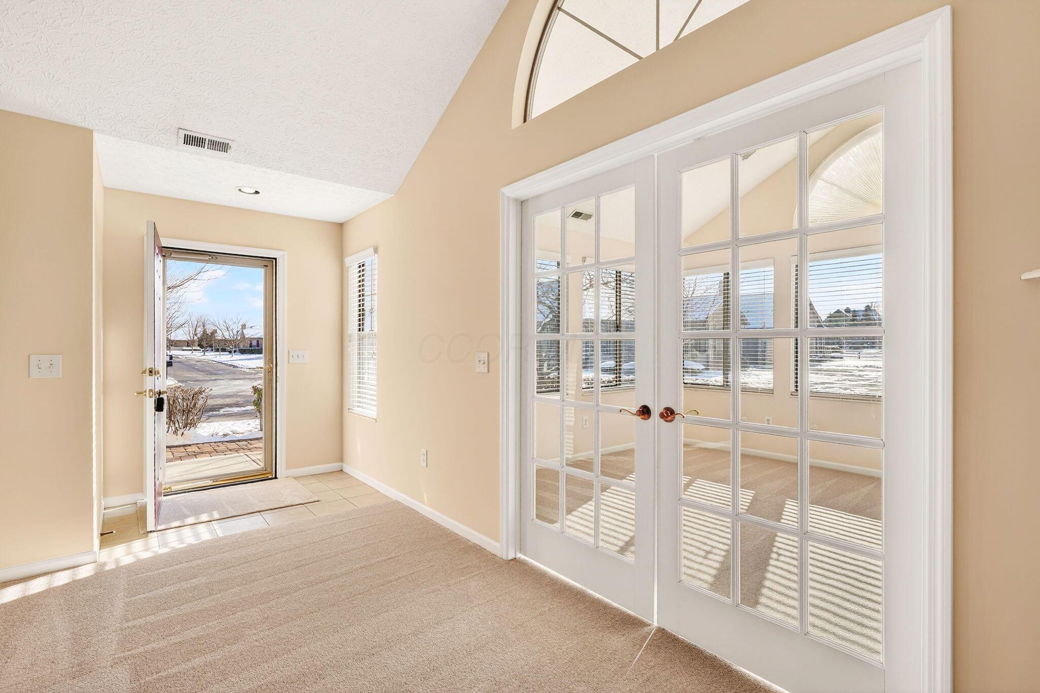 3731 Stoneway Point Powell, OH 43065 - Photo 6 of 47 Foyer with full view storm door