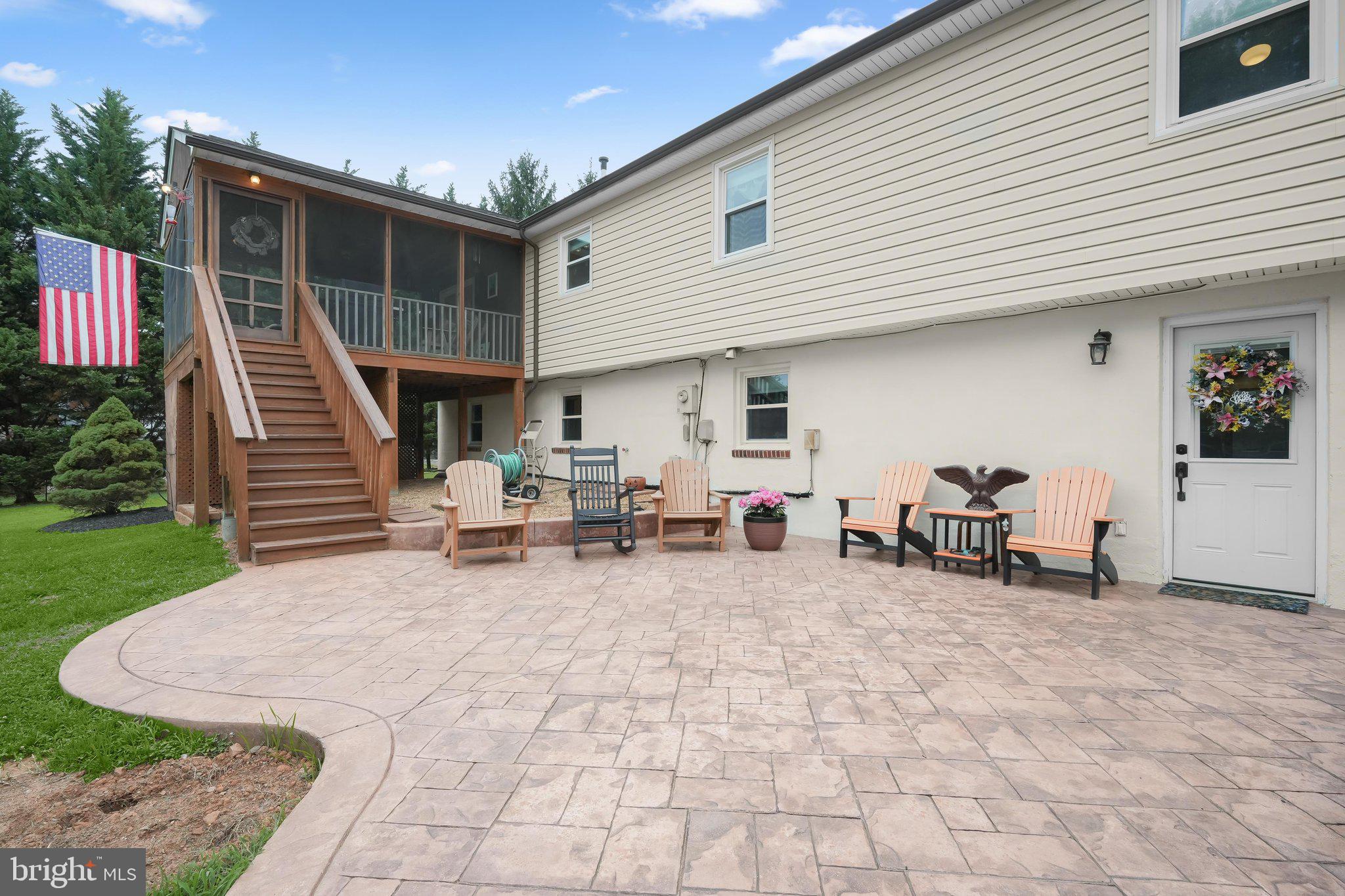 7079 Riley Road Warrenton, VA 20187 - Photo 55 of 97 Screened Porch w/ Stairs to Stamped Concrete Patio