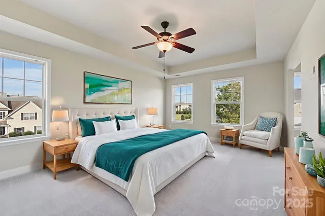 a bedroom with a bed and a couch