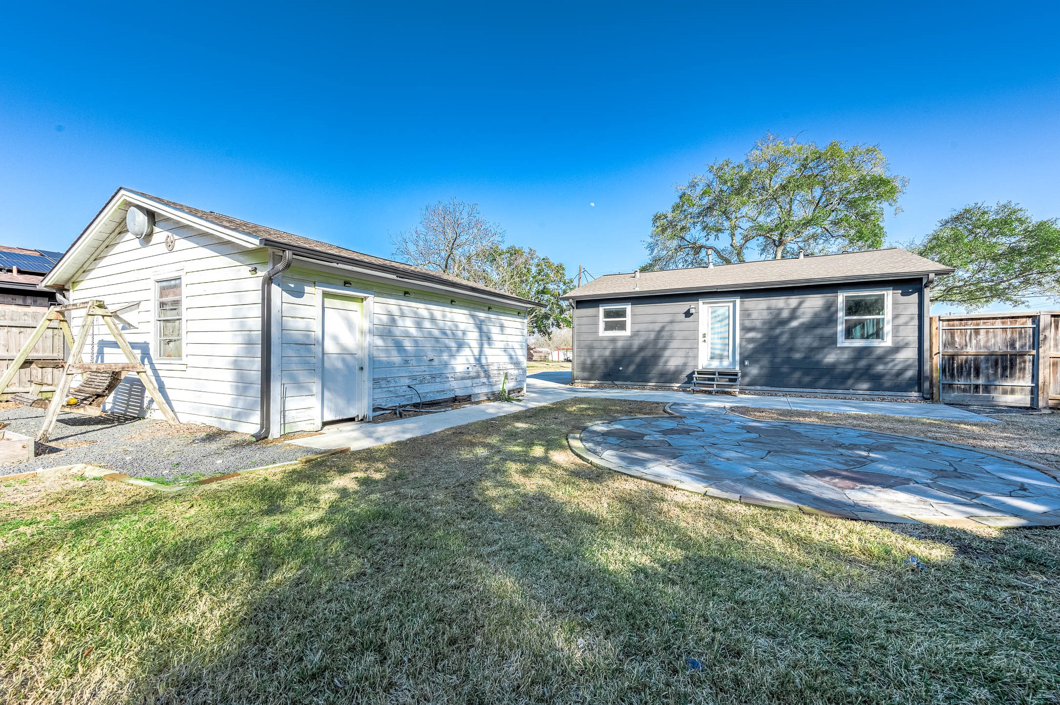 2738 Lilac Street Pasadena, TX 77503 - Photo 24 of 26 a view of a house with backyard and sitting area