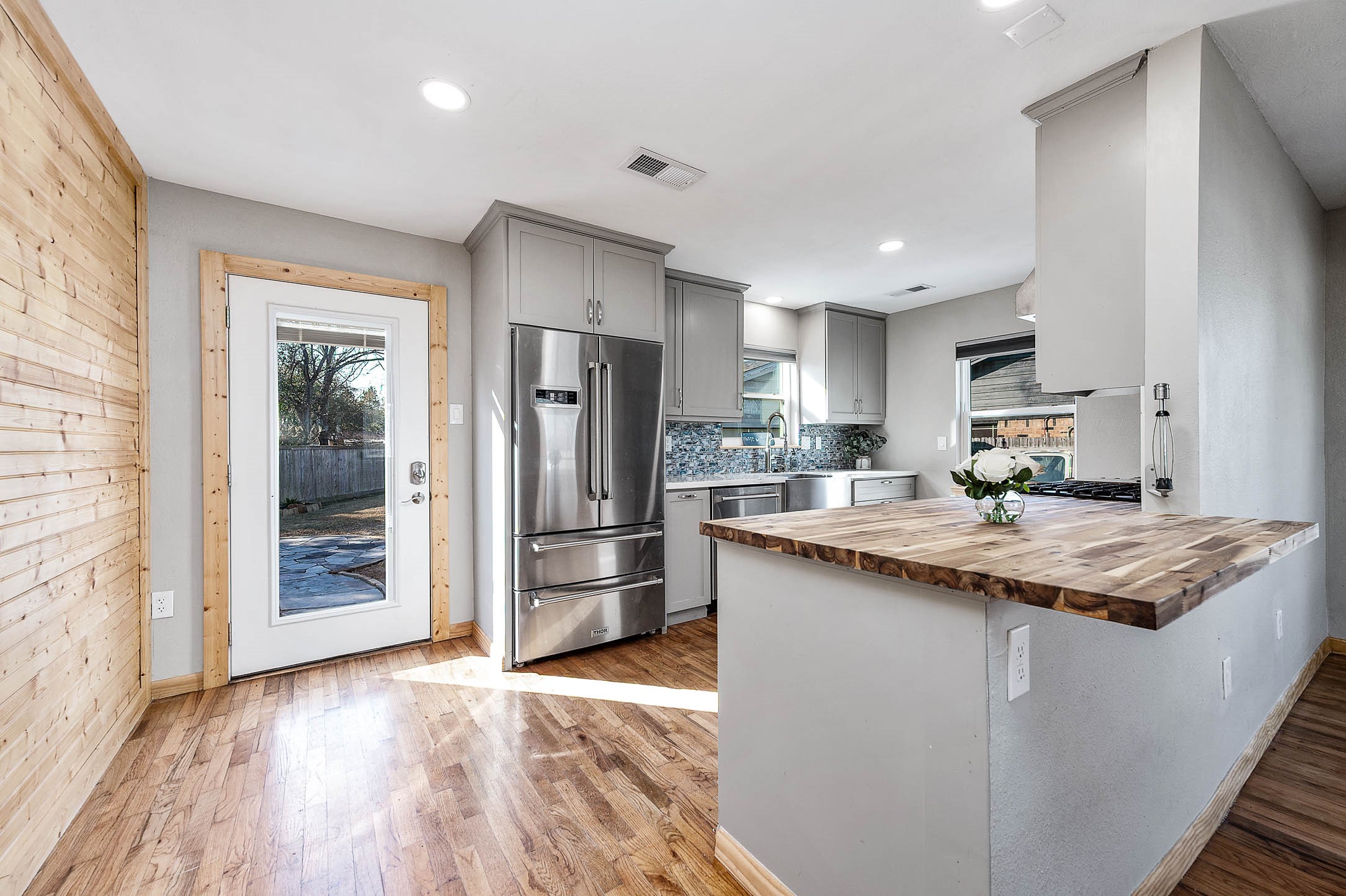 2738 Lilac Street Pasadena, TX 77503 - Photo 7 of 26 a kitchen with stainless steel appliances granite countertop a refrigerator and a stove top oven