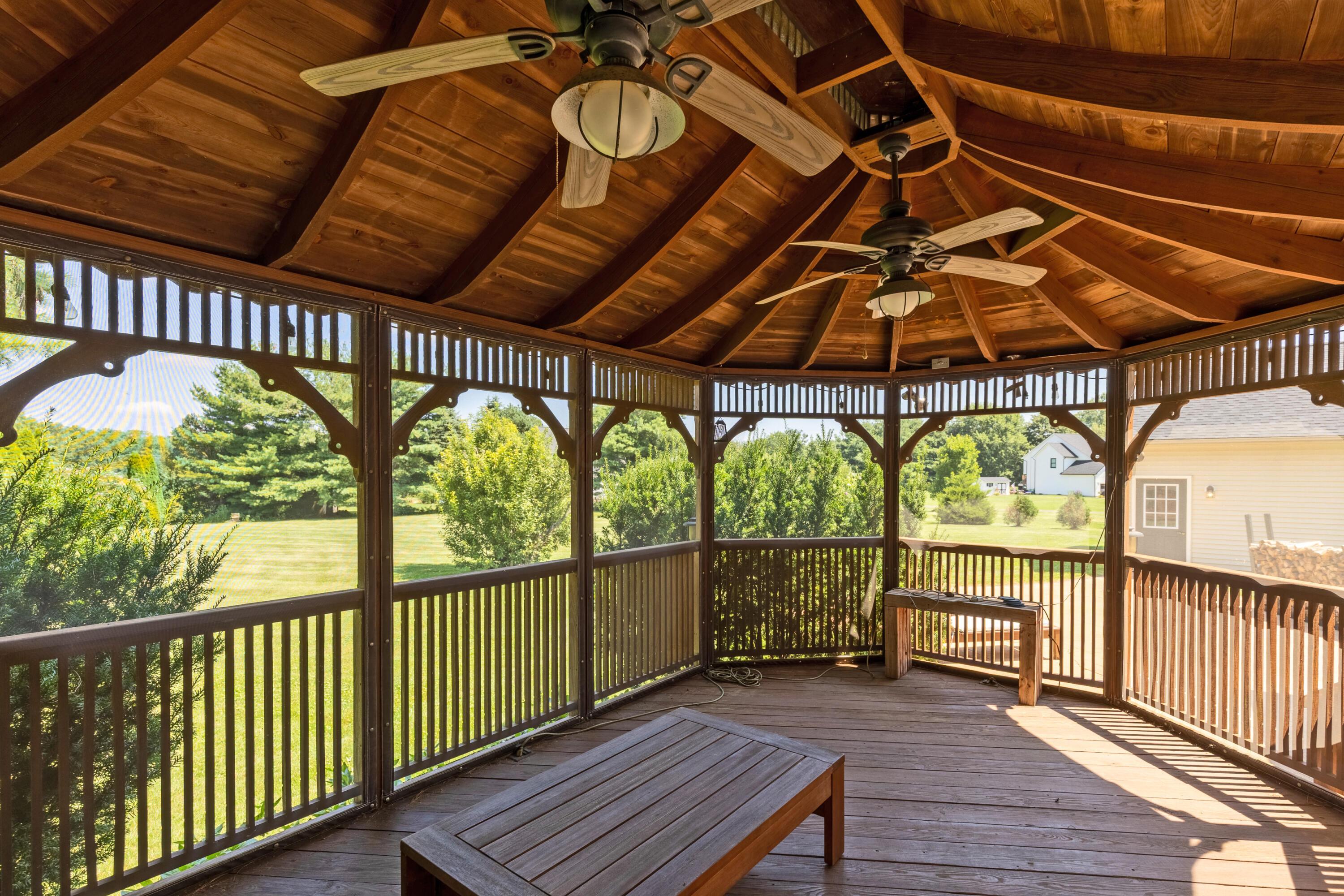 1515 Dale Ford Road Delaware, OH 43015 - Photo 61 of 74 • Deck flooring • (2) lighted ceiling fans