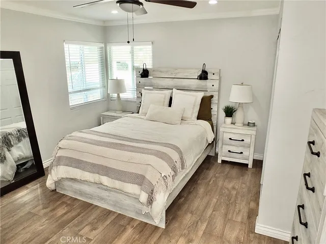 a large white bed in a white room