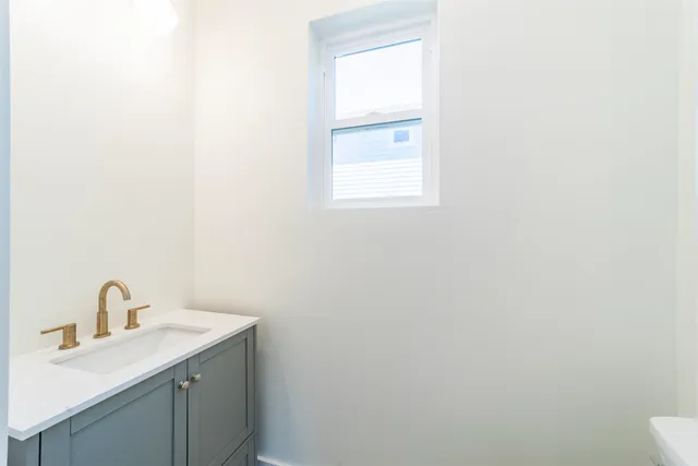 a bathroom with a sink and a toilet