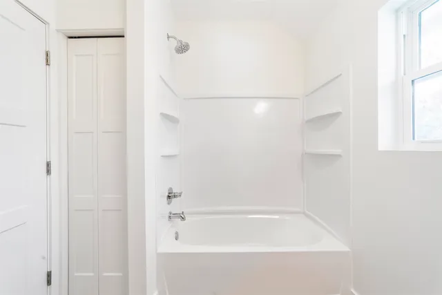 a bathroom with a bathtub