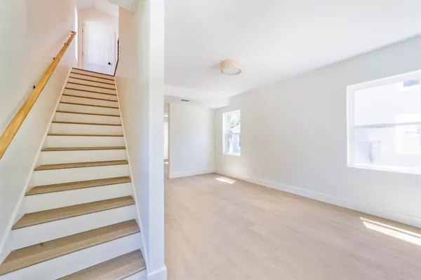 a bathroom with a sink a toilet and a bathtub