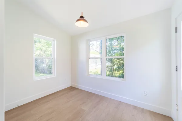 an empty room with windows