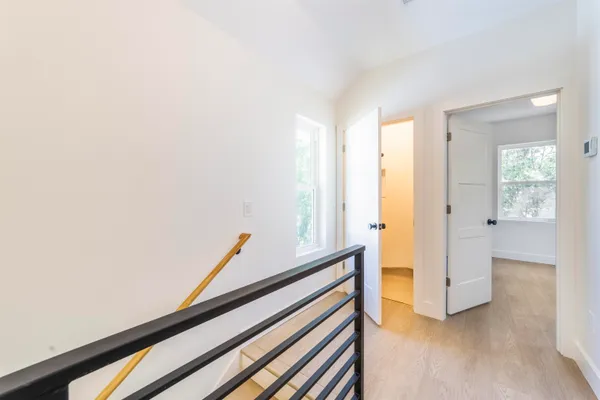 a view of front door with wooden floor