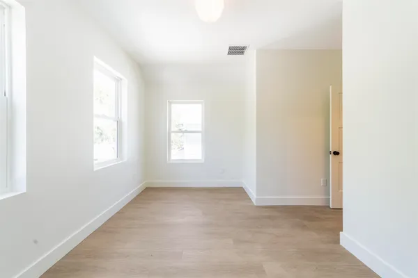 an empty room with windows